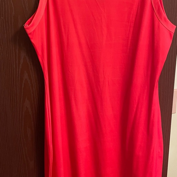 Orange body con dress with colorful motif of artist face and scarf on front. - Picture 2 of 4